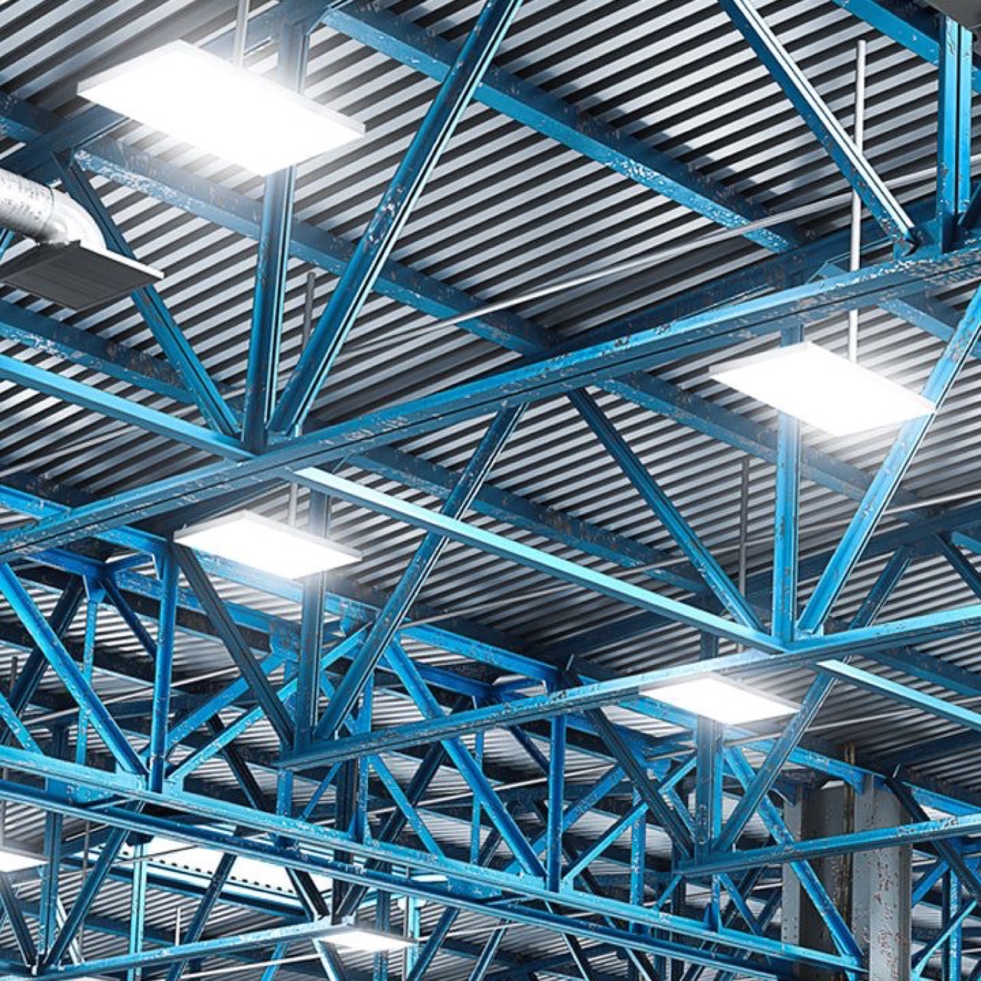 Iluminación tipo high bay instalada en estructura de techo industrial